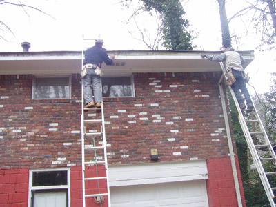 Seamless 5 and 6 inch aluminum gutters installed on a home
